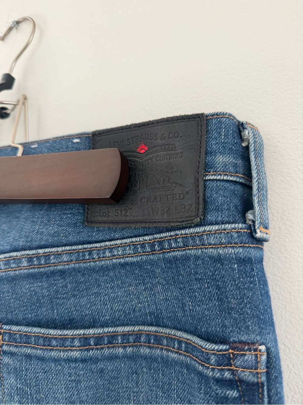 Levi's 512 Slim Taper blue denim jeans with black leather patch